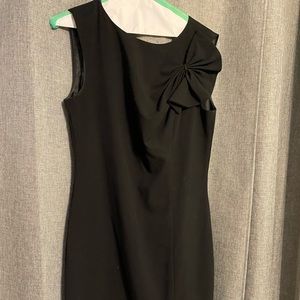 Black suit sheath dress with ruffle accent